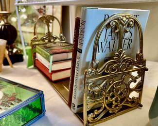 Wow on this solid brass book rack with a solid brass base & a back stop rod. A very nice piece.