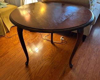 Here’s the drop leaf triangular table with the leaves up…it turns to round!