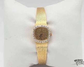 1103  14k Gold Omega Watch with Diamond Accents 