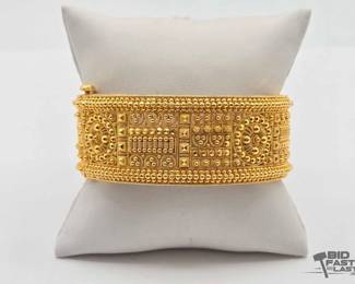 652  18k Gold Screw Bangle, 49.7g 