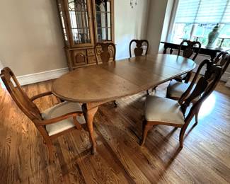 BUY IT NOW! $295.00. Stanley Furniture oval table with two leaves, six dining chairs, two are arm/captain's chairs.
