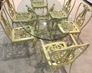 BUY IT NOW! $675.00. French Provincial Style Oval Glass top table w/six cast aluminum chairs. Two captain's chairs, four chairs.     40" W x 66" L x 28 3/4" H.