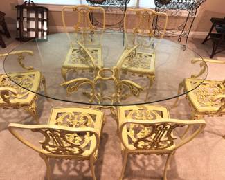 BUY IT NOW! $675.00. French Provincial Style Oval Glass top table w/six cast aluminum chairs. Two captain's chairs, four chairs.     40" W x 66" L x 28 3/4" H.