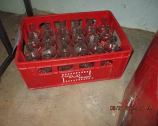 POP crate and bottles