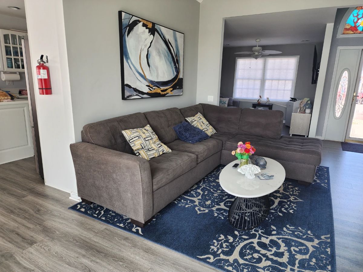 SECTIONAL AND CARPET SOLD