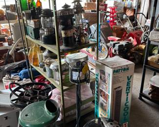 Sump pump, oscillating fan, wood stove, small Weber grill, kerosene lamps, lamp oil