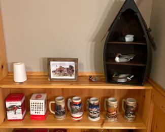 Collector Beer Steins, Die Cast Motorcycle, Collector Duck Decoys, and Canoe Shelf