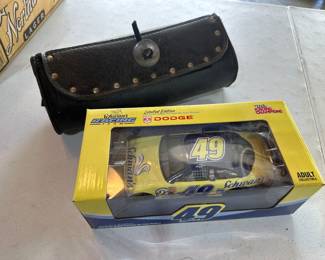 Motorcycle pouch, die cast car NIOB