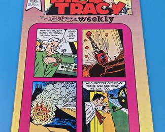 "Dick Tracy Weekly" issue #95.
It features the popular detective character Dick Tracy, known for his crime-fighting adventures.