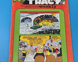 This is a Dick Tracy Weekly comic book, issue #71, published by Jackthorng Publishing.
It features the popular detective character Dick Tracy in a weekly comic strip format.
The comic book's cover highlights a "Family Time" theme with a Christmas setting, specifically referencing Christmas 1959.