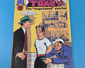 "Dick Tracy" comic book titled "The 'unprinted' stories".
Dick Tracy: A long-running American comic strip created by Chester Gould. It features a tough, intelligent police detective and his rogues' gallery of grotesque villains.