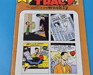 This is a Dick Tracy Weekly comic book, issue #74.
It features the popular detective character Dick Tracy, created by Chester Gould.
The comic was published by Ackthora Publishing, and this specific issue is dated from 1989.