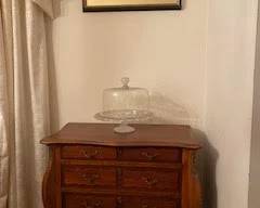 great piece, bar inside furniture, cake plate and japanese print.