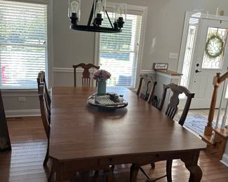 6 cushioned chairs with dining room table, chandalier also available