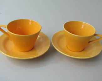 Yellow Harlequin cups and saucers