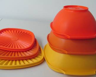 Three 1970s Tupperware bowls with lids