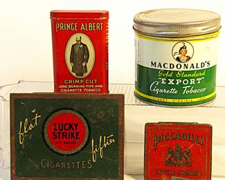 Four vintage tobacco tins