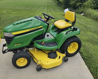 Like new 2020 John Deere X580 lawnmower 54" mower deck with acc. 47" snowblower, roto spreader, trailer, and lawnmower sweeper all like new. Selling all together $7800.