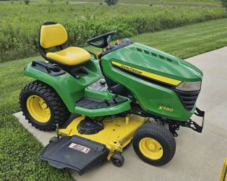Like new 2020 John Deere X580 with accessories.