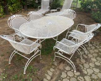 Wrought Iron Oval Dining Table W/ 6 Bouncing Arm Chairs