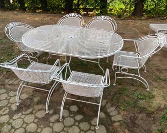 Wrought Iron Oval Dining Table W/ 6 Bouncing Arm Chairs