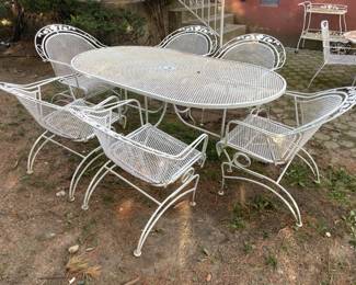 Wrought Iron Oval Dining Table W/ 6 Bouncing Arm Chairs