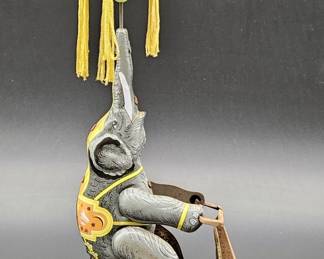 Tin Litho Wind-Up Toy- Elephant on Bike Spins Ball