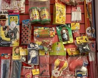 1950's New Old Stock Dime Store Trick Toys, Jacks,
Marbles, Dick Tracy Set, Indian Headdress, Whoopie Cushion, and so much more - see pictures
All toys included and come in their original factory packages