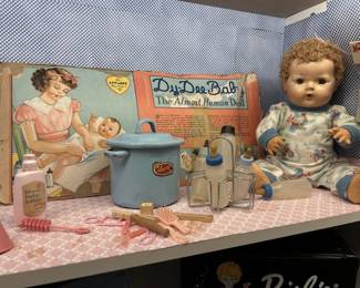 1950's Effanbee Dy-Dee Baby Almost Human Doll
One of the 1st drink and wet dolls
Baby Bottles on Carousel & Bottle Pot