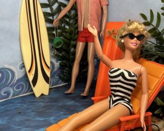 1963 Ken w/ Surfboard & 1959 Barbie w/ Zebra Suit,
Chaise, Floatie, and other 3D decor