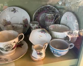 Display Cabinets W/ Vintage Travel Souvenirs, Books, Figurines, Etc.