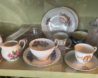 Display Cabinets W/ Vintage Travel Souvenirs, Books, Figurines, Etc.