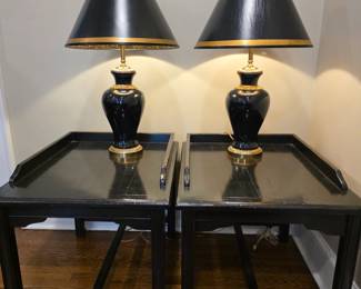 Black lacquered tables and exquisite vintage lamps