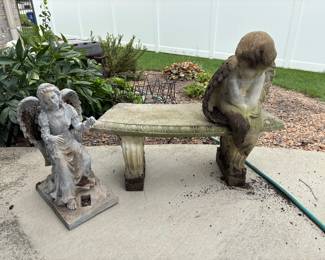 Cement lawn bench with angel. The feet are as is on the angel.