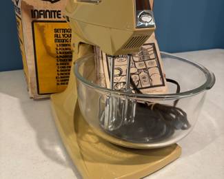 This is new in the original box Vintage old stack. She never used this. It did develop a small crack from being in storage on one side of it.