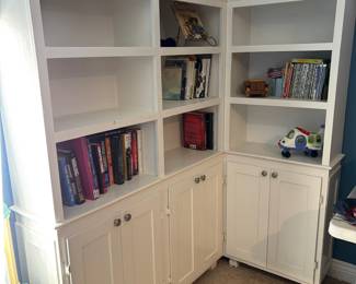 White shelving all wood with cabinet bottoms they do come apart for easy moving as of now they are assembled together to fit in the corner