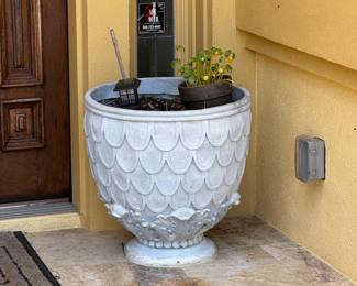 Many large concrete planters