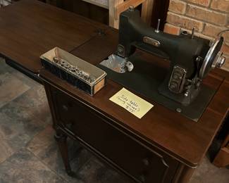 Sewing machine cabinet that can double as bedside table.