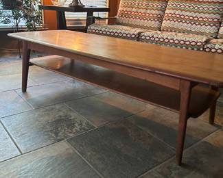 Teak wood coffee table.