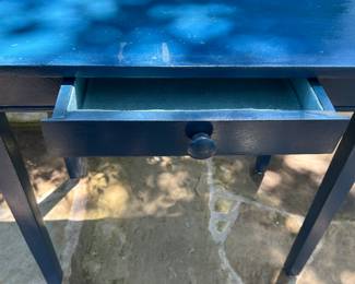 Small table with drawer.