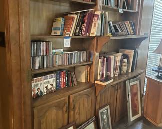 Books, DVDs and framed art.