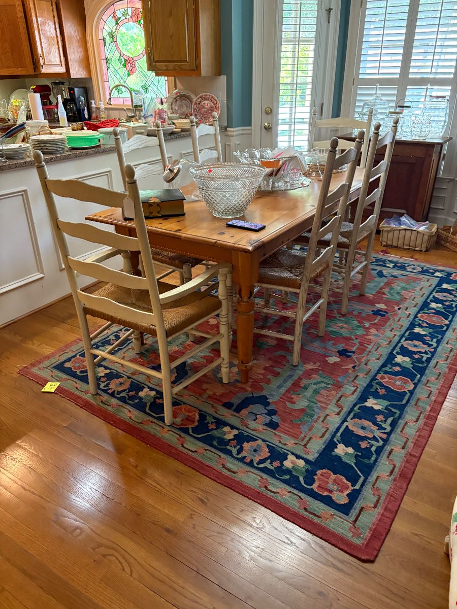 Rug is sold. Table will be $150.00 on Tuesday and the chairs will also be $150.00. So this set up is $300.00 on Tuesday.