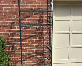 Just an iron shelf with no glass.  We drug it out of the basement hoping someone would buy it to make a trellis out of it.  