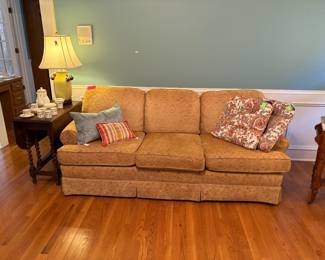 Barley Twist drop-leaf table is sold.  It sold after I took the picture of the sofa and I didn’t realize it.  Sorry if I cause