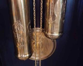 Weights included with Grandfathers Clock. We have been unsuccessful in finding the name of the manufacturer.