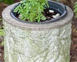 This Planter is very unique with images in relief