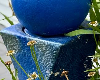 Love this deep blue pedestal and Blue Globe