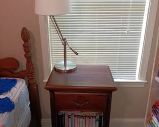 Nightstand, chrome adjustable lamp
