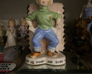 Figurines in garage metal cabinet