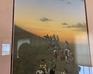 Natives on horseback at sunset
